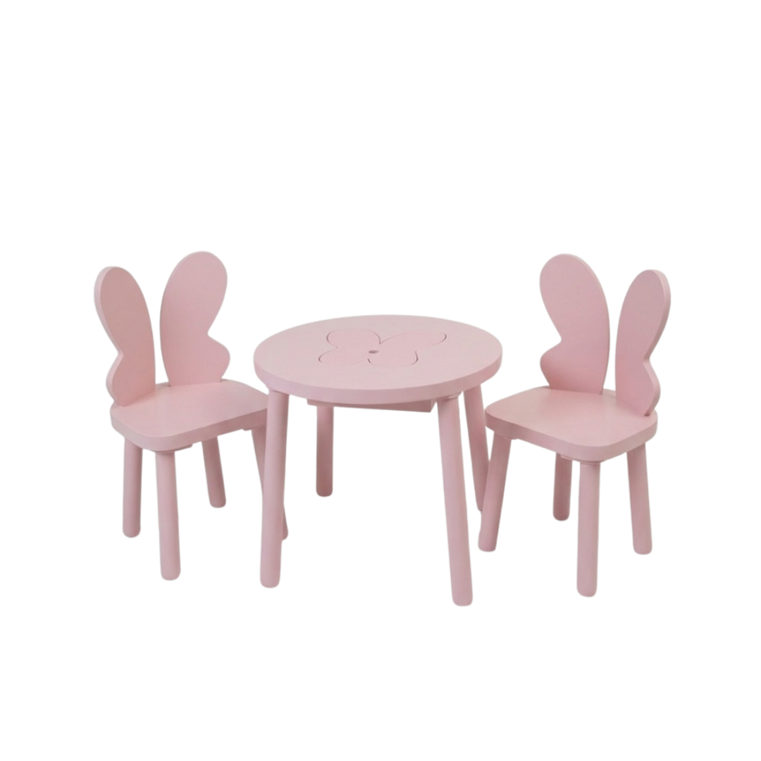 Mesa redonda con dos sillas de mariposa todas rosas