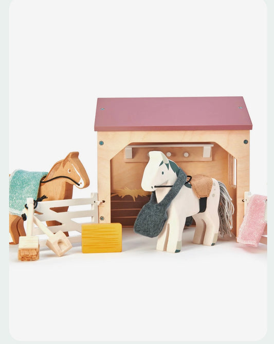 Caballos en el establo