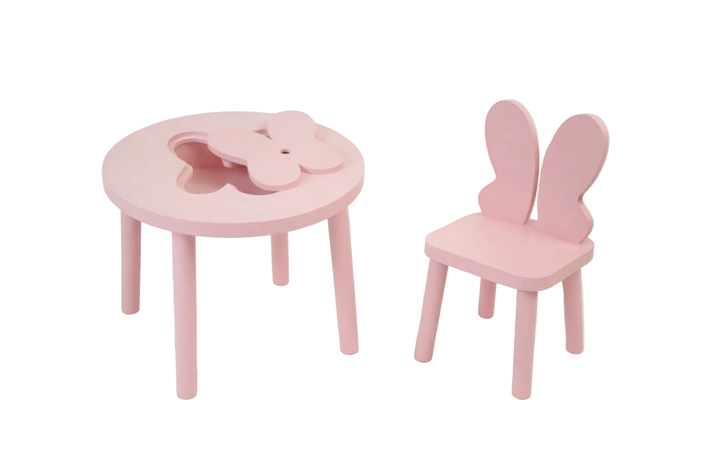 Mesa redonda con dos sillas de mariposa todas rosas